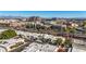 Aerial view of community near a canal and city skyline at 6945 E Glenrosa Ave, Scottsdale, AZ 85251
