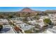 Aerial view of community with Camelback Mountain in the background at 6945 E Glenrosa Ave, Scottsdale, AZ 85251