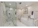 Luxurious bathroom with marble finishes, walk-in shower, and soaking tub at 6945 E Glenrosa Ave, Scottsdale, AZ 85251