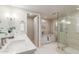 Elegant bathroom with double vanity, soaking tub, and shower at 6945 E Glenrosa Ave, Scottsdale, AZ 85251