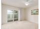 Bright bedroom with patio access and ceiling fan at 6945 E Glenrosa Ave, Scottsdale, AZ 85251