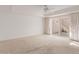 Spacious bedroom with access to private patio and ceiling fan at 6945 E Glenrosa Ave, Scottsdale, AZ 85251