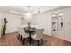 Elegant dining room featuring a chandelier and seating for six at 6945 E Glenrosa Ave, Scottsdale, AZ 85251