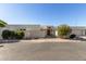 Single-story home with stucco exterior, landscaped yard, and attached garage at 6945 E Glenrosa Ave, Scottsdale, AZ 85251