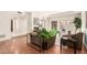 Spacious living room with hardwood floors and access to the patio at 6945 E Glenrosa Ave, Scottsdale, AZ 85251