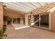 Private patio with pergola and access to the home at 6945 E Glenrosa Ave, Scottsdale, AZ 85251