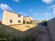 Spacious backyard with firepit and grassy area at 703 W Magena Dr, San Tan Valley, AZ 85140