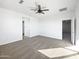 Spacious bedroom with ceiling fan and carpet at 703 W Magena Dr, San Tan Valley, AZ 85140