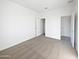 Simple bedroom with carpet flooring and double door closet at 703 W Magena Dr, San Tan Valley, AZ 85140