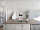 Modern kitchen with double sink island and stainless steel appliances at 703 W Magena Dr, San Tan Valley, AZ 85140