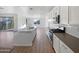 Modern kitchen with island and stainless steel appliances at 703 W Magena Dr, San Tan Valley, AZ 85140