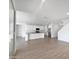 Modern kitchen with white cabinets, stainless steel appliances, and an island at 703 W Magena Dr, San Tan Valley, AZ 85140