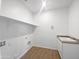 Laundry room with a utility sink and shelving at 703 W Magena Dr, San Tan Valley, AZ 85140