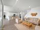 Open living room featuring neutral colors, modern furniture, and kitchen view at 703 W Magena Dr, San Tan Valley, AZ 85140