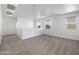Spacious loft area with carpeted floors at 703 W Magena Dr, San Tan Valley, AZ 85140
