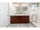 Double vanity bathroom with modern finishes at 750 W Flintlock Way, Chandler, AZ 85286