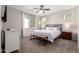 Bright bedroom with ceiling fan and ample closet space at 750 W Flintlock Way, Chandler, AZ 85286