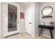 Inviting entryway with coat rack and storage at 750 W Flintlock Way, Chandler, AZ 85286
