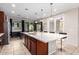Bright kitchen with large island, ample counter space, and breakfast bar at 750 W Flintlock Way, Chandler, AZ 85286