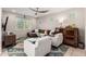 Comfortable living room with L-shaped sofa and two armchairs at 750 W Flintlock Way, Chandler, AZ 85286