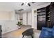 Spacious office with built-in shelving and a comfortable seating area at 750 W Flintlock Way, Chandler, AZ 85286
