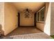 Covered patio with ceiling fan and access to yard at 750 W Flintlock Way, Chandler, AZ 85286