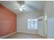 Spacious bedroom with tile floors and a large window at 9020 E Brittle Bush Rd, Gold Canyon, AZ 85118