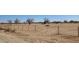 Vacant lot with chain link fencing and distant mountains at 000 W Pony Rd, Maricopa, AZ 85139