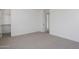 Light and airy bedroom with plush carpeting, a large closet, and an open feel at 10236 E Ursula Ave, Mesa, AZ 85212