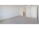 Simple bedroom with carpet flooring and ensuite bathroom at 10236 E Ursula Ave, Mesa, AZ 85212