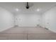 Spacious two-car garage with epoxy flooring and opener at 10236 E Ursula Ave, Mesa, AZ 85212