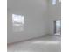 Spacious living room with high ceilings and sliding glass doors at 10236 E Ursula Ave, Mesa, AZ 85212