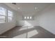 Bright and airy loft area with carpeted floor and multiple windows at 10236 E Ursula Ave, Mesa, AZ 85212