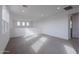 Bright and airy loft area with carpeted floor and multiple windows at 10236 E Ursula Ave, Mesa, AZ 85212