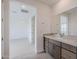 Bathroom with single vanity and access to bedroom at 10249 E Ulysses Ave, Mesa, AZ 85212