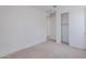 Spacious bedroom with a large closet and neutral walls at 10249 E Ulysses Ave, Mesa, AZ 85212