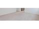 Spacious bedroom with carpeted floors and an ensuite bathroom at 10249 E Ulysses Ave, Mesa, AZ 85212