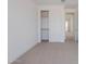 Bright bedroom with neutral walls and carpet at 10249 E Ulysses Ave, Mesa, AZ 85212