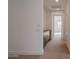 Hallway with built-in storage and neutral carpet at 10249 E Ulysses Ave, Mesa, AZ 85212