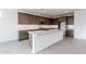Modern kitchen with island, stainless steel appliances, and ample cabinetry at 10249 E Ulysses Ave, Mesa, AZ 85212