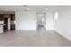 Bright living room with tile floors and access to kitchen and hallway at 10249 E Ulysses Ave, Mesa, AZ 85212