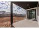 Covered patio with sliding glass door and backyard access at 10249 E Ulysses Ave, Mesa, AZ 85212