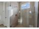 Modern shower with glass enclosure and skylight at 10249 E Ulysses Ave, Mesa, AZ 85212