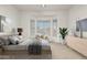 Spacious bedroom with bay window and ample light at 10310 E Posada Ave, Mesa, AZ 85212