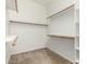 Large walk-in closet with ample shelving and hanging space at 10310 E Posada Ave, Mesa, AZ 85212