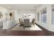 Bright dining room with large windows and seating for six at 10310 E Posada Ave, Mesa, AZ 85212