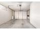 Attached garage with space for one car and extra storage at 10343 W Prairie Hills Cir, Sun City, AZ 85351