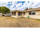 Rear view of the house showing a large yard at 10343 W Prairie Hills Cir, Sun City, AZ 85351