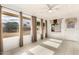Sunroom with large windows and tile flooring at 10343 W Prairie Hills Cir, Sun City, AZ 85351