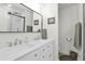 Modern bathroom with double vanity, mirror, and shower at 1225 W Wood Dr, Phoenix, AZ 85029